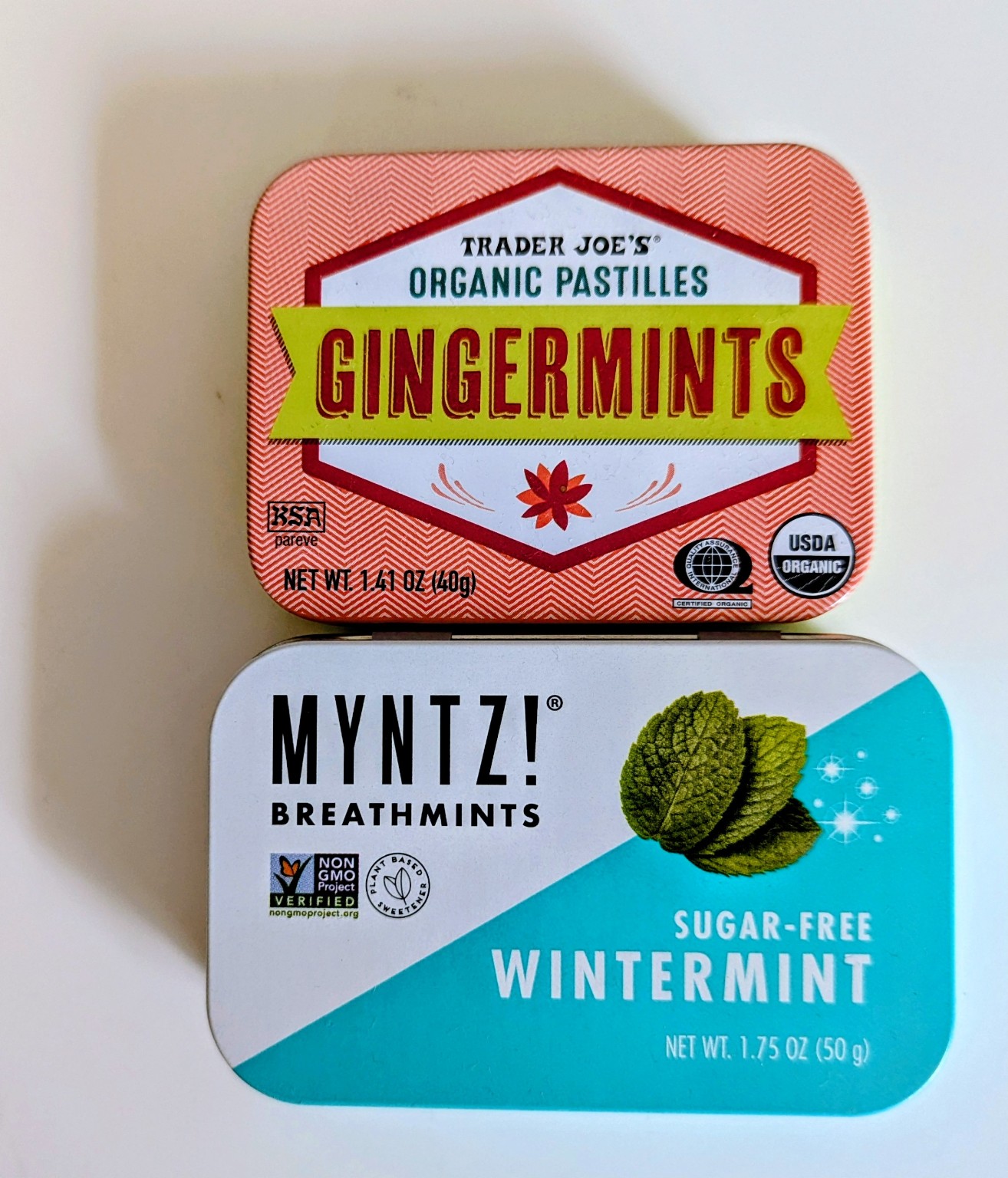 Trader Joe’s Gingermints and Myntz breath mint tins before being turned into watercolor palettes