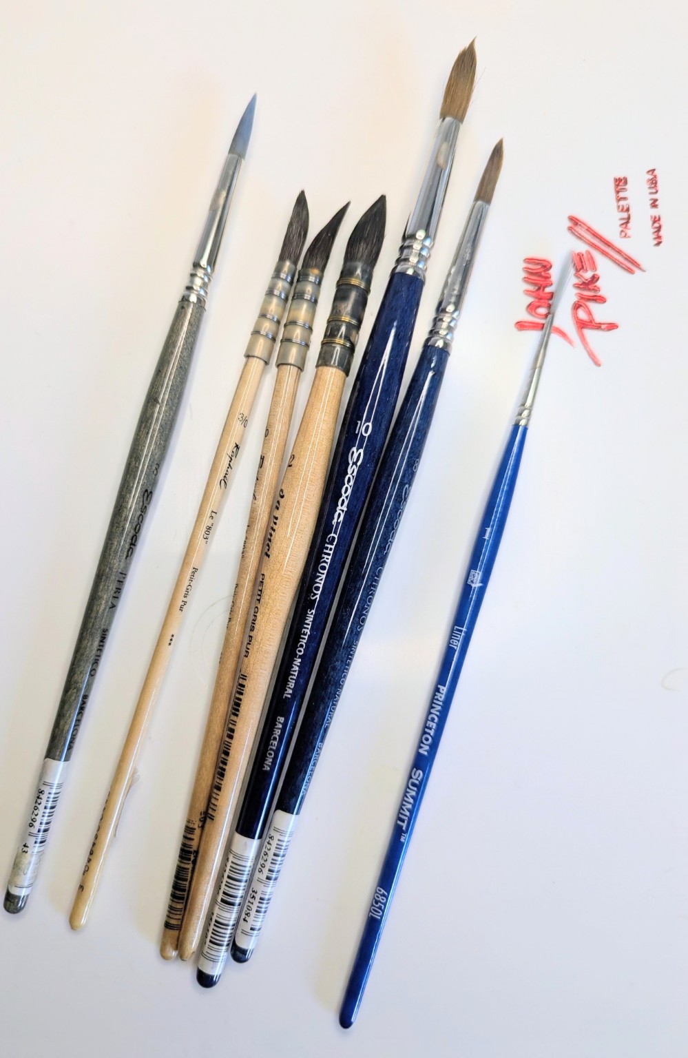 My collection of soft watercolor mop brushes, Escoda Chronos and Perla rounds, and a small Princeton liner